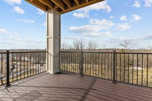 Spacious balcony with scenic countryside view from Cedar Crest Independent Living Apartments in Janesville, WI.