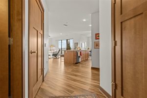 Entryway leading to open-concept kitchen and living room at Cedar Crest Independent Living community