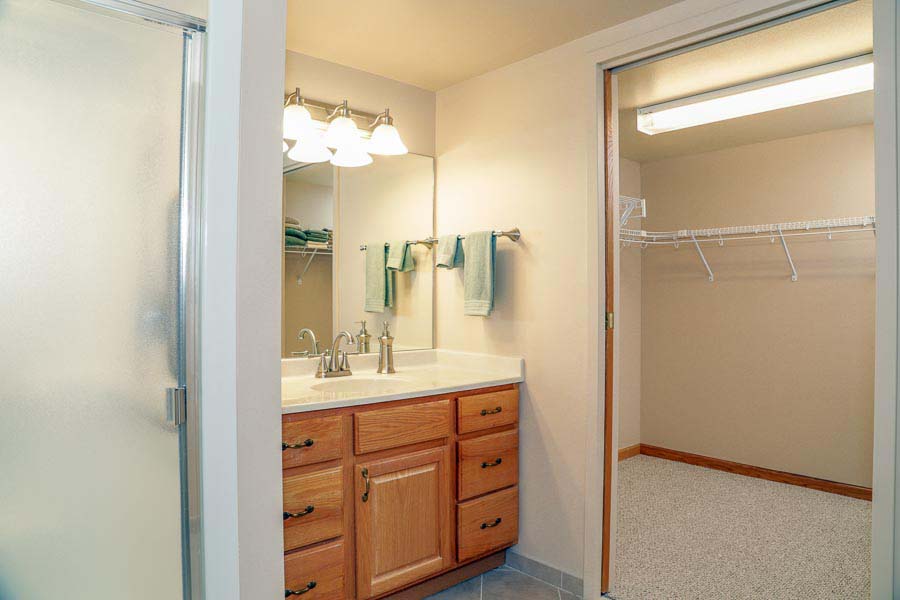 Bathroom with walk-in clost