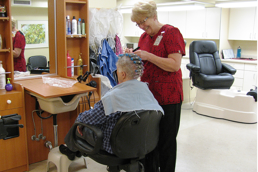 Female resident getting a perm